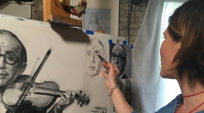 Patricia Watwood working on a posthumous portrait of Jack Benny