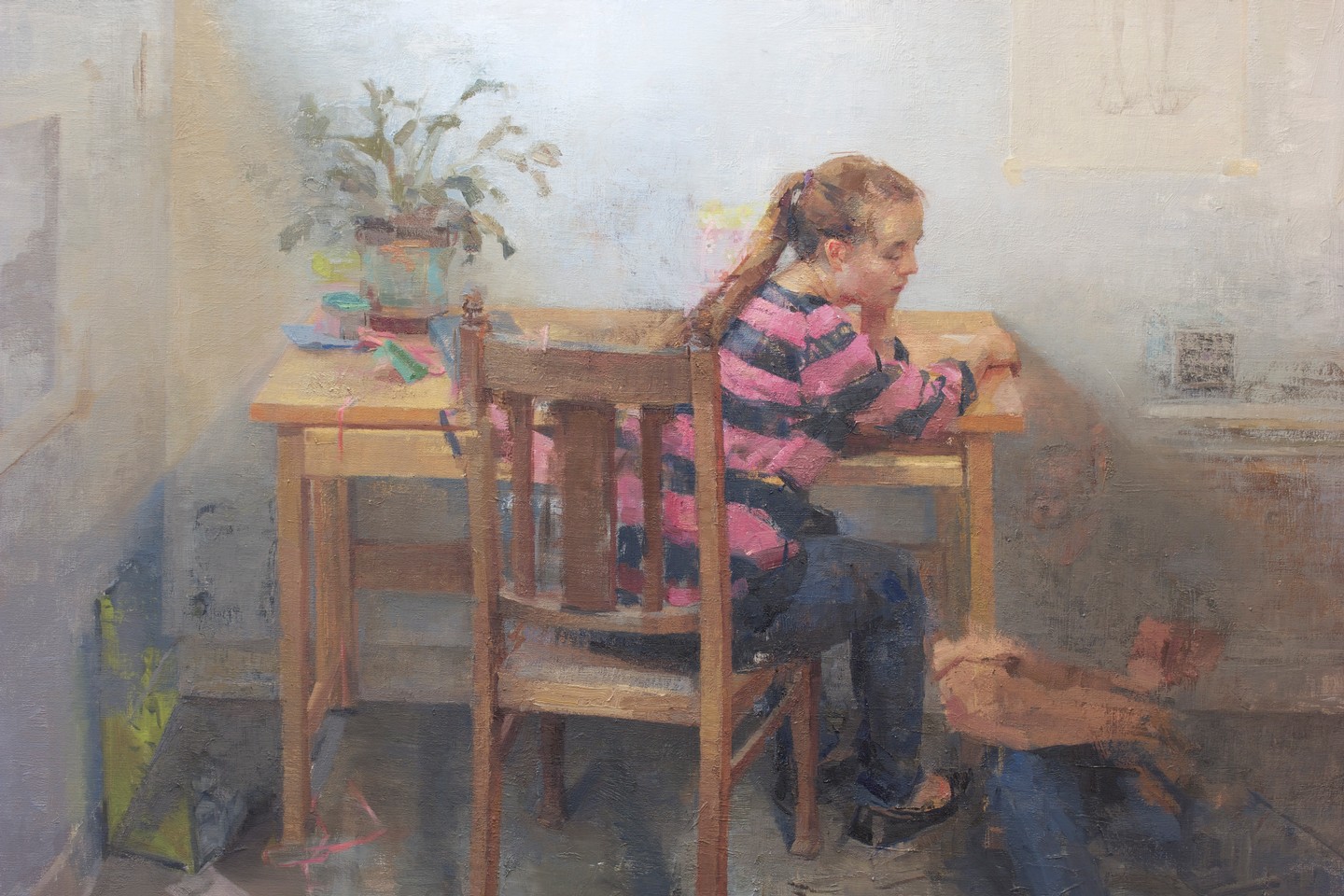 Painting of a child at a desk