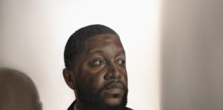 portrait oil painting of a man looking off in the distance