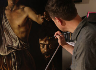 Deciphering Caravaggio: David with the Head of Goliath Jeremy Caniglia at his easel, painting a master copy of “David with the Head of Goliath”
