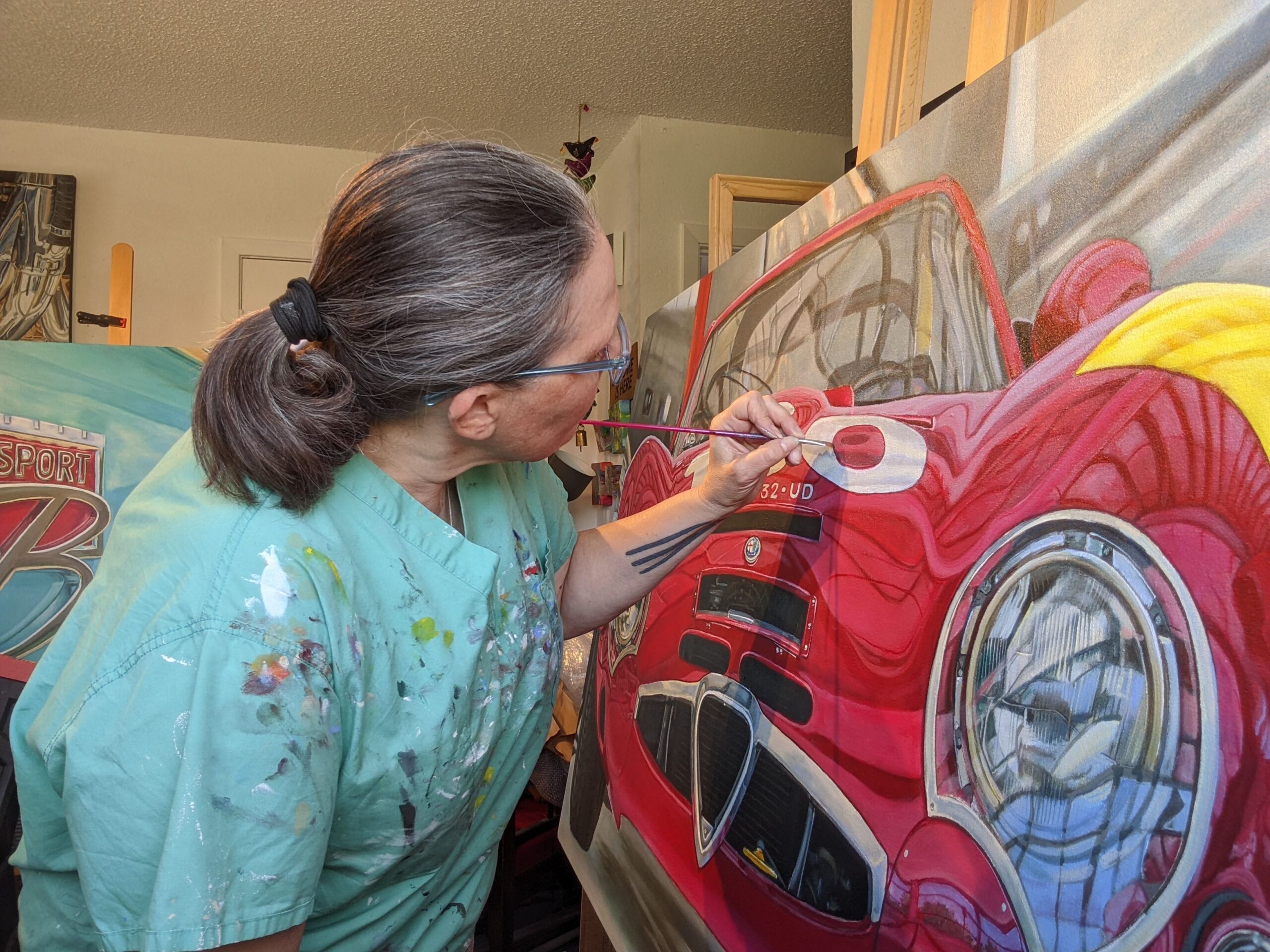 Working on a hyper-realist painting of an Alfa Romeo TZ2