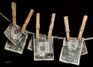 Lynn Pratt, "Money Laundering," watercolor, 21 x 15 in.; painting of money hanging from clothespins